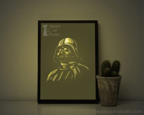 Paper layered shadow box Darth Vader with yellow light on the table
