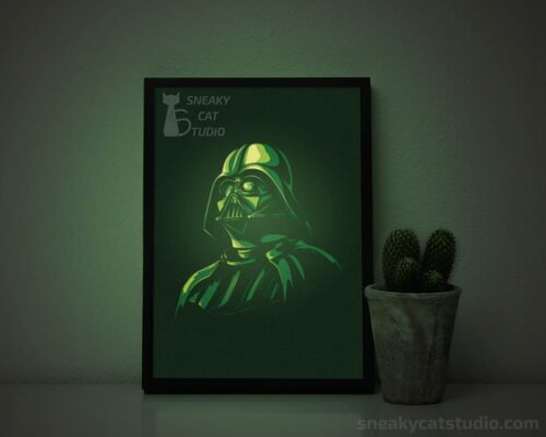 Paper layered shadow box Darth Vader with green light on the table