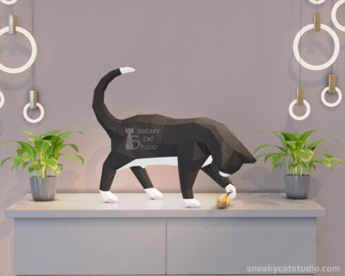 Polygonal geometric black-white Cat on the table playing with a banana near the plants main view