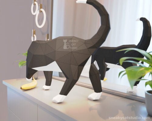 Polygonal geometric black-white Cat on the table playing with a banana near the plants back view